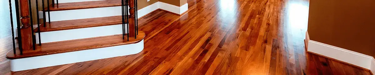 Base floor of a staircase with professionally restored wood flooring in San Francisco CA