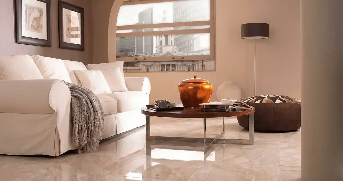 Modern living room with professionally installed marble flooring, a beige sofa, coffee table in San Francisco, CA