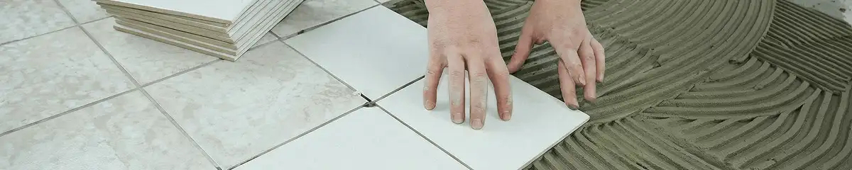 Professional installing white tile floors in San Francisco, CA